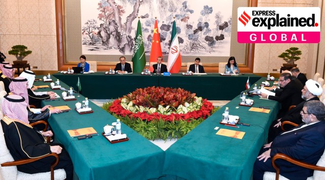 Wang Yi, China's most senior diplomat, center, presides over a closed meeting between Iran, led by Ali Shamkhani, the secretary of Iran's Supreme National Security Council, at right, and Saudi Arabia, led by Saudi national security adviser Musaad bin Mohammed al-Aiban, at left, in Beijing, Saturday, March 11, 2023.