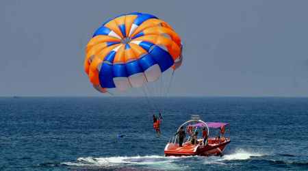 A tourist does parasailing at Kovalam, in Thiruvananthapuram, Friday, Feb. 24, 2023. (PTI Photo)