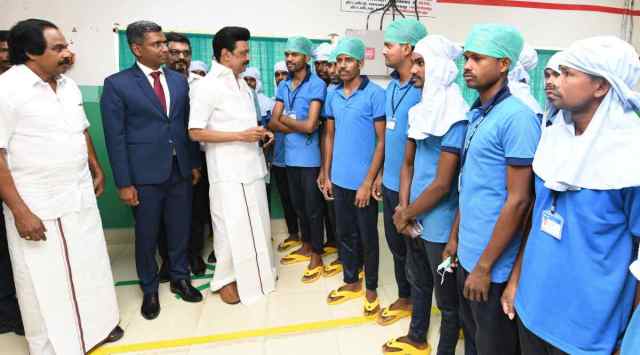 Tamil Nadu Chief Minister M K Stalin at a surgical gloves manufacturing unit at Kavaalkinaru. 