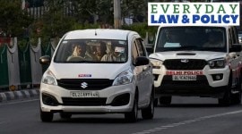 Manish Sisodia in a car with govt officials.