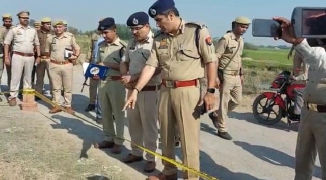 Policemen at the spot of the encounter in Kaundhiyara area of Prayagraj on Monday. (Express photo))