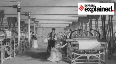 Illustration of power loom weaving during Britain's industrial revolution showing machines in rows in a factory-like setup.