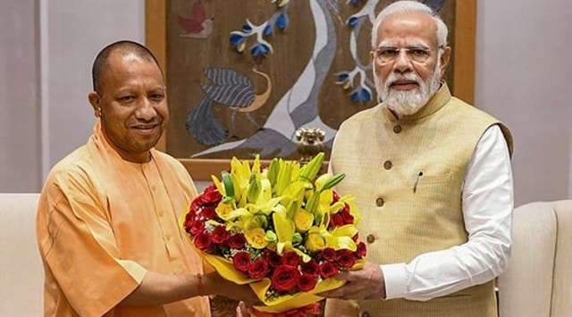 Prime Minister Narendra Modi with UP Chief Minister Yogi Adityanath in New Delhi on Tuesday. (Photo: PTI) 