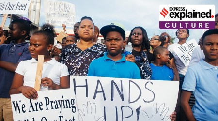 "Hands up! Don't shoot!" signs displayed at Ferguson protests in 2014.