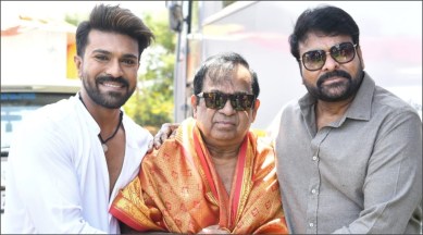 Ram Charan and Chiranjeevi honouring Brahmanandam