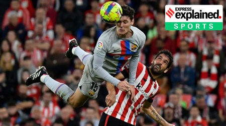 Andreas Christensen jumps over Raul Garcia to head the ball