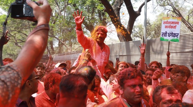 Congress candidate Ravindra Dhangekar and his supporters celebrate his victory in the Kasba Peth bypoll. (Express photo by Pavan Khengre)