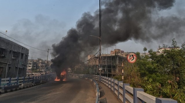 Day after 7-year-old’s murder, protesters clash with cops in Kolkata’s Tiljala; police vehicle torched
