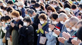 People observe a moment of silence to mark the 12-year anniversary of the March 2011 earthquake and tsunami disaster in Iwaki no alt set