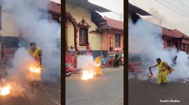 old woman playing with firecrackers