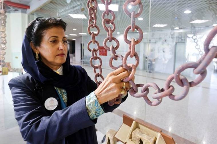 Awatif Al-Keneibit, a Saudi artist, shows her art in her studio, an art-form previously frowned upon in the country but now gaining more acceptance, in Riyadh, Saudi Arabia, March 9, 2023. REUTERS/Ahmed Yosri