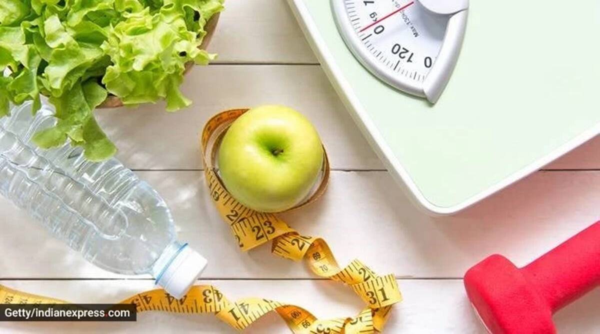 Premium Photo  Scale and apple for a happy back to the health