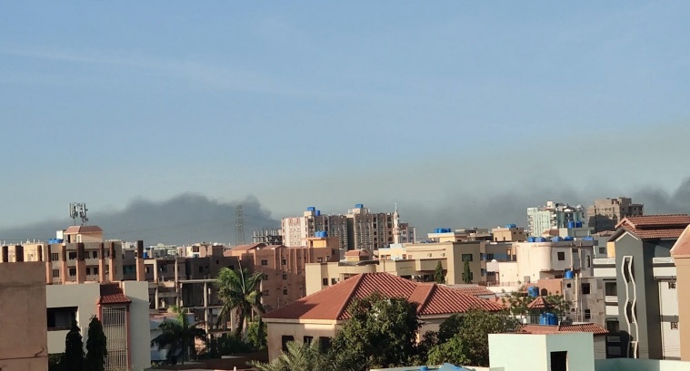 A general view shows a cloud of smoke in Khartoum
