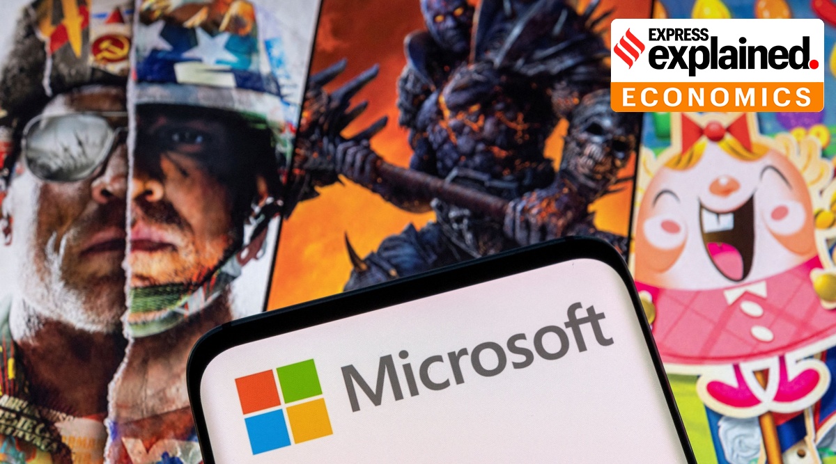 The Microsoft logo is seen on a smartphone placed on displayed Activision Blizzard's games characters in this illustration taken January 18, 2022.