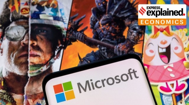The Microsoft logo is seen on a smartphone placed on displayed Activision Blizzard's games characters in this illustration taken January 18, 2022.