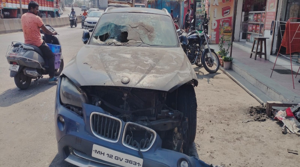 Watch Moving BMW car catches fire on Pune road, offduty firefighter
