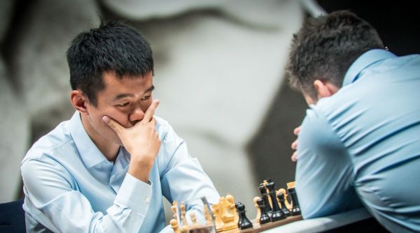 Ding Liren in action in Game 4 of the World Chess Championship against Ian Nepomniachtchi.