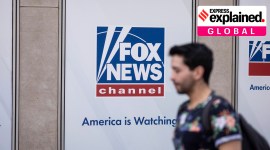 A person walks past the Fox News Headquarters in New York, April. 12, 2023.