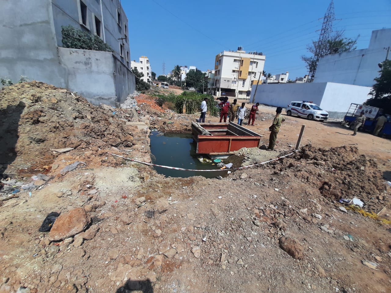 Toddler death, pit accident, BWSSB, Karnataka, Thippagondanahalli lake project, Bengaluru, negligence, migrant workers, government engineer, contractor, valve chamber, criminal complaint, compensation