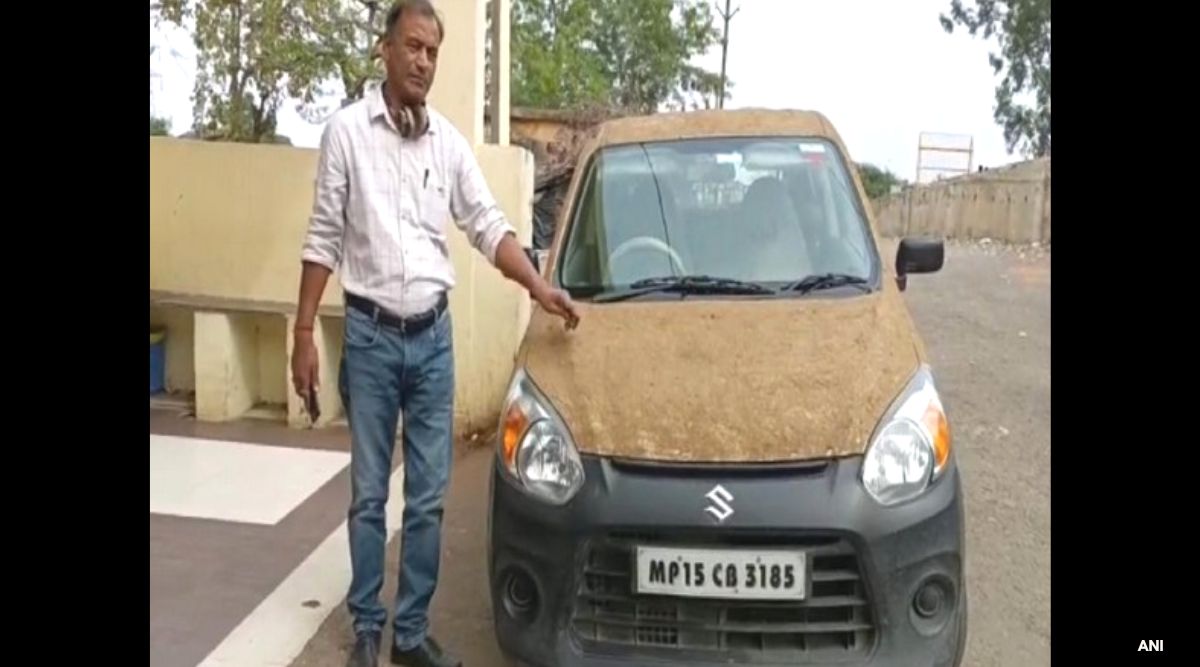‘Sunscreen for car’ Homeopathic doctor coats car with cow dung to beat