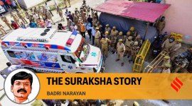 Police personnel guard as an ambulance carries the body of gangster-turned-politician Atiq Ahmed's son Asad Ahmed for his last rites at Kasari-Masari graveyard, in Prayagraj. (Photo: PTI)