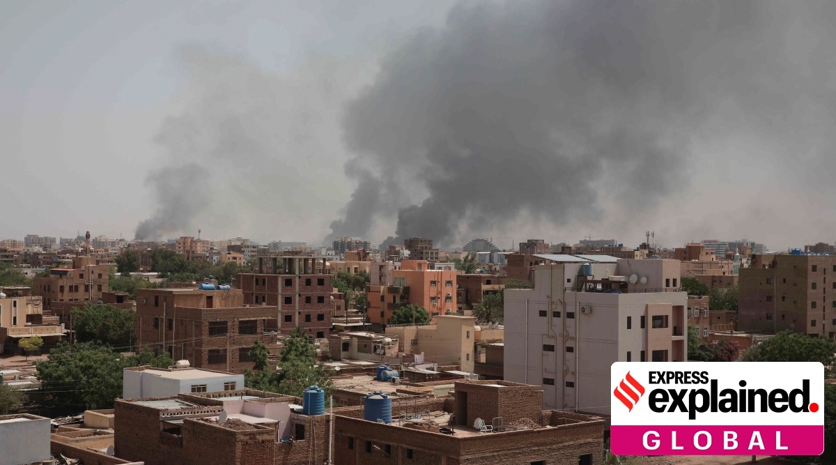 Smoke rises from a central neighborhood of Khartoum, Sudan, Sunday, April 16, 2023, after dozens have been killed in two days of intense fighting.