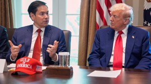 Secretary of State Marco Rubio speaks during a cabinet meeting at the White House, Wednesday, April 30, 2025, in Washington, as President Donald Trump look on. (AP Photo/Evan Vucci)