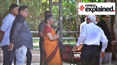 Maya Kodani waiting outside court in Ahmedabad.