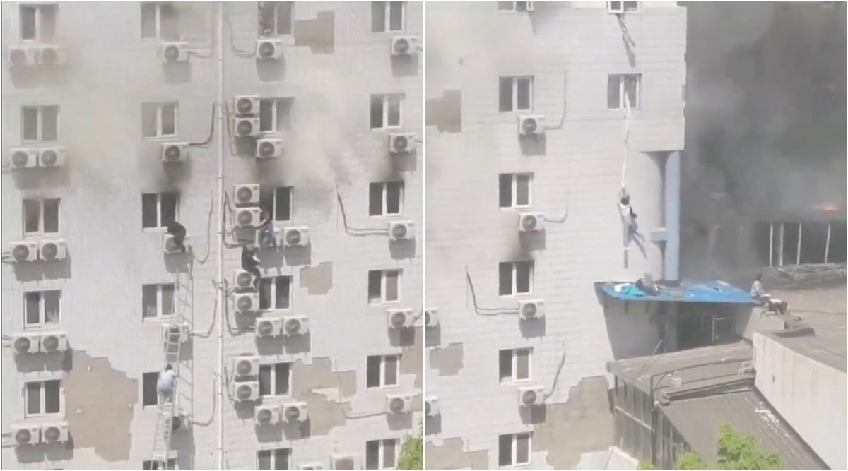 Fire In Beijing Hospital Forces Trapped To Escape From Windows Using ...