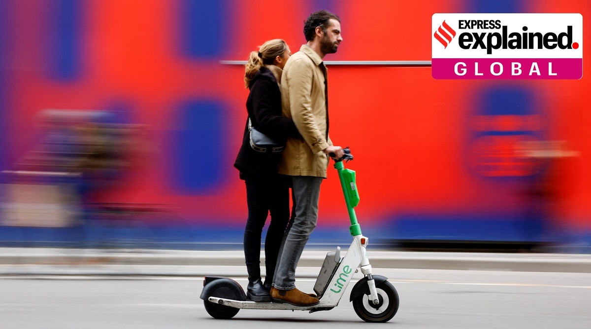 People ride electric scooters on the eve of a public vote to ban or not rental electric scooters in Paris