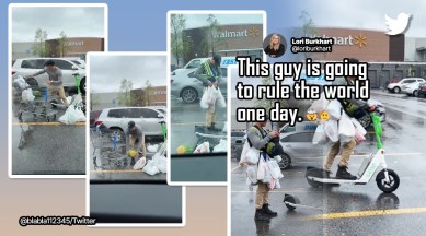 guy carries groceries on an e-kick scooter