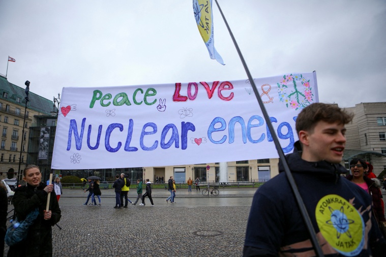 People protest as Germany shuts down its last three nuclear power plants in Berlin
