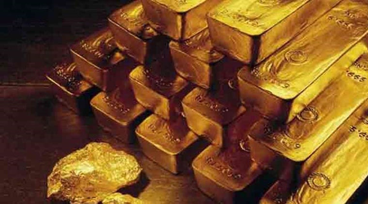 Gold off one-year highs as dollar firms ahead of US payrolls data ...