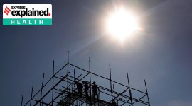 Workers work at the Metro Construction site in Chembur Naka in Mumbai under the unrelenting heat, in late February, 2023.