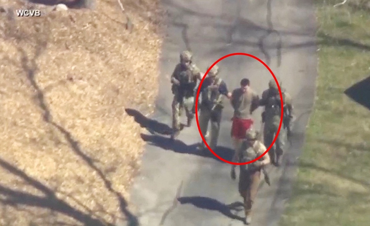 FBI agents arrest Jack Teixeira, an employee of the US Air Force National Guard, in connection with an investigation into the leaks online of classified US documents, outside a residence in this still image taken from video in North Dighton, Massachusetts, US, April 13, 2023. (WCVB-TV via ABC via Reuters)