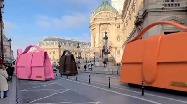 Watch: Giant Jacquemus handbags zip through the streets of Paris ...