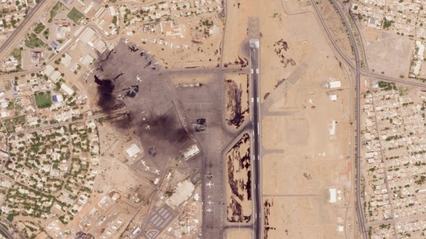 This satellite photo from Planet Labs PBC shows damaged aircraft, including one on fire, at Khartoum International Airport in Khartoum, Sudan, Monday, April 17, 2023. Satellite images from Planet Labs PBC analyzed Tuesday by The Associated Press show the extent of the destruction from days of fighting in Sudan between rival military forces, including some 20 aircraft either damaged or destroyed at Khartoum's airport. (Planet Labs PBC via AP)
