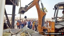 After NGT ruling, a few studios in Malad were pulled down by authorities on Friday morning. (Express photo by Amit Chakravarty)
