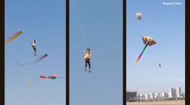 man flying hundreds of feet on kite China