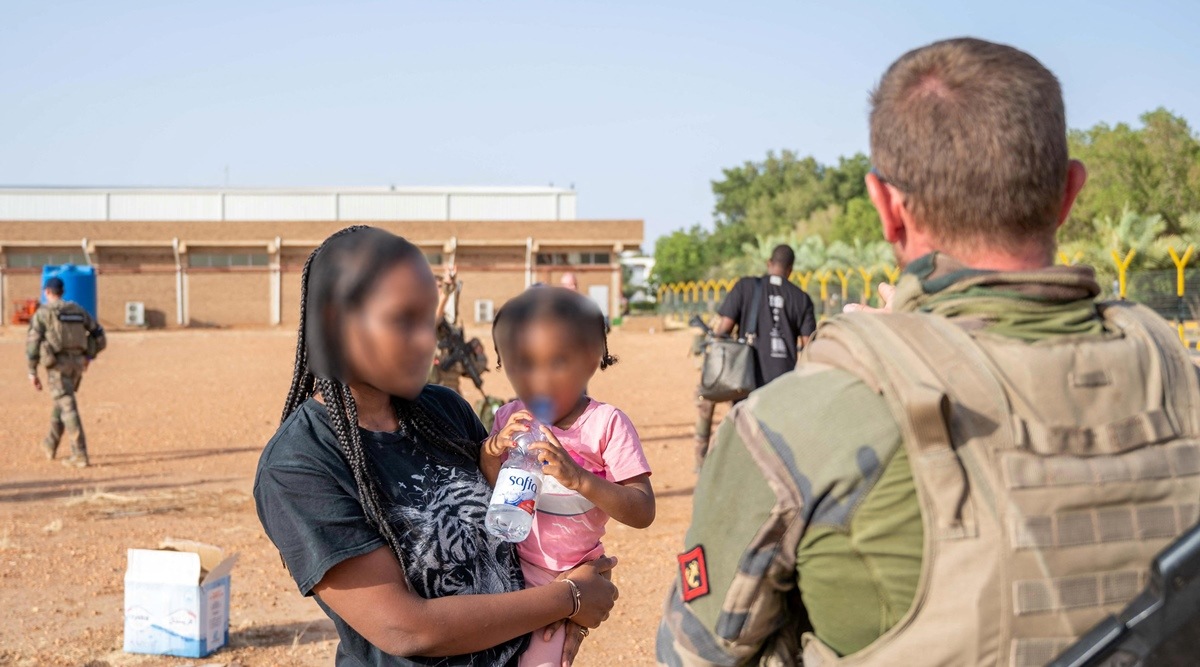 French soldiers evacuate French citizens, as part of the "Operation Sagittaire" evacuation by the French army, in Khartoum, Sudan, April 23, 2023. (Etat-major des armees/Handout via Reuters)