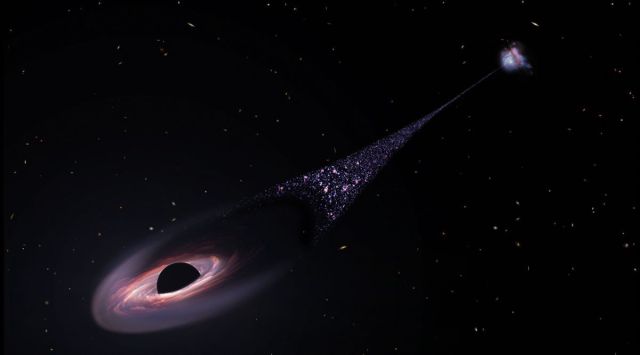 Runaway black hole rockets through space, leaving behind trail of newborn stars