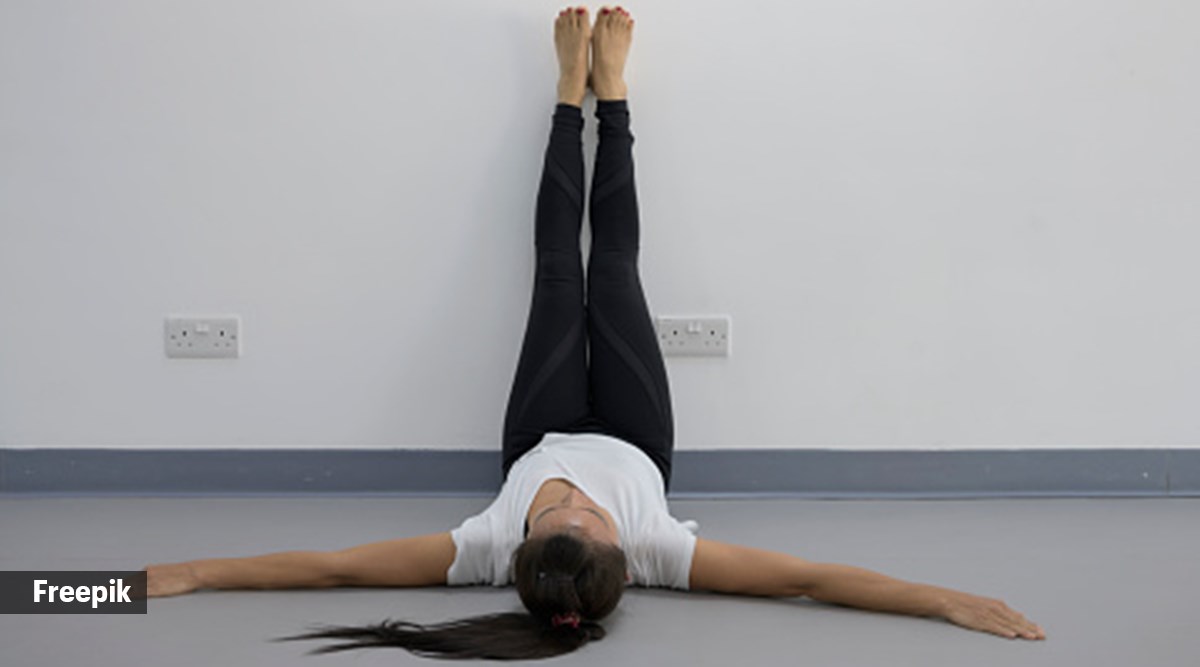 Five simple yoga asanas you can practice using a wall | Fitness News - The  Indian Express