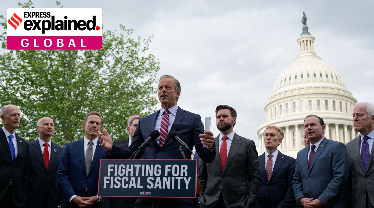 U.S. Senator John Thune (R-SD) speaks during a press conference calling on U.S. President Joe Biden to negotiate with Republicans in order to make a deal on raising the debt ceiling on Capitol Hill in Washington, U.S., May 3, 2023. They stand in front of a podium reading 'fighting for fiscal sanity'.