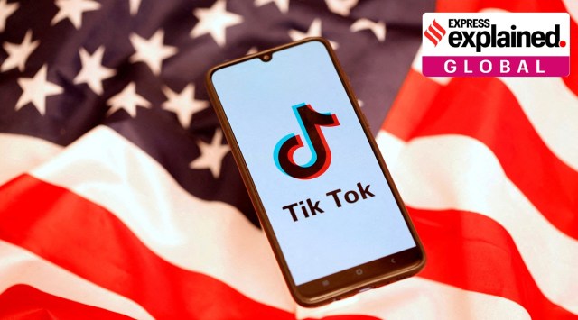 TikTok logo is displayed on the smartphone while standing on the U.S. flag in this illustration picture taken, November 8, 2019.
