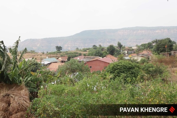 Manghar village, which has a population of just 466, is sprawled across 482 acres but has just 99 acres of agricultural land. The rest is forest land. The village is surrounded by a dense forest of jamun trees that has proved to be a boon for its beekeepers. (Express photo by Pavan Khengre)