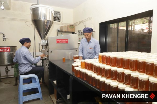 The Maharashtra State Khadi and Village Industries Board's Directorate of Beekeeping Industry has provided a machine to process the honey and label the jars. (Express photo by Pavan Khengre)