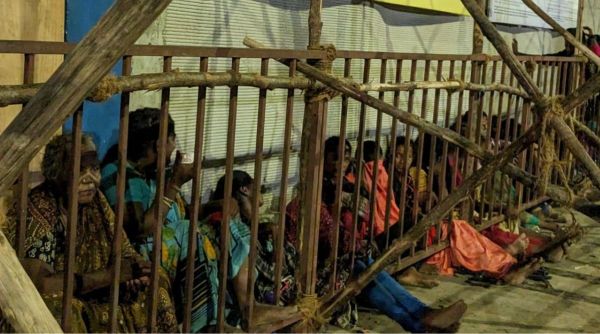 Women outside Chepauk late on Thursday night. Most of these women are getting paid Rs 800 to stand in queue and pass on tickets to black market racketeers. (Photo: Venkata Krishna B/Indian Express)