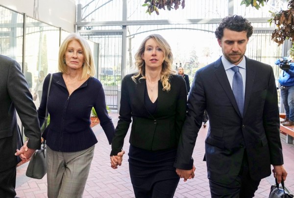 Former Theranos CEO Elizabeth Holmes arrives with family to appeal her conviction on four counts of fraud, in San Jose, Calif. on Friday, March 17, 2022. (Jim Wilson/The New York Times)