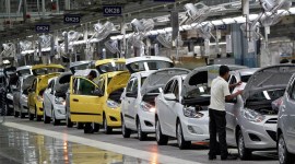 Workers assemble cars inside the Hyundai Motor India Ltd. plant at Kancheepuram district in Tamil Nadu