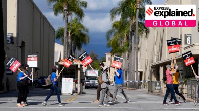 Members of the Writers Guild of America picket outside an entrance to Warner Bros. Studios, Tuesday, May 2, 2023, in Burbank, California.